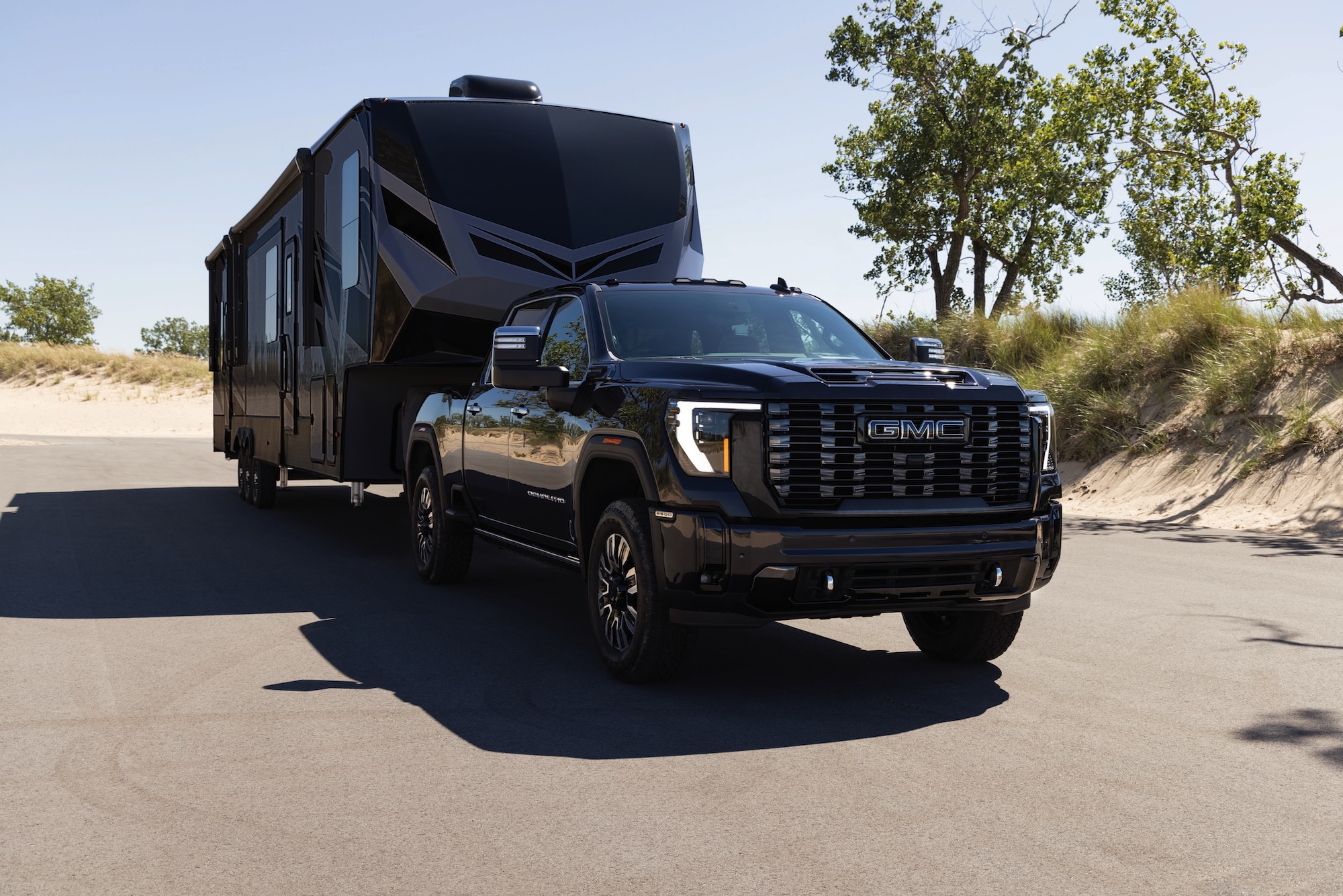 2026 GMC Sierra 2500 HD towing camper trailer