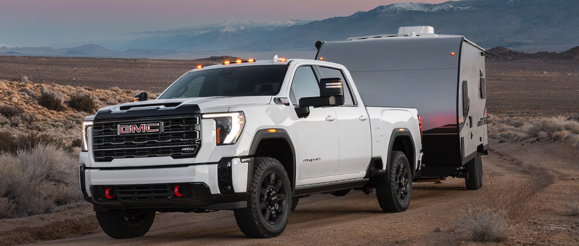 GMC MultiPro Tailgate open on the 2026 Sierra 2500 HD AT4 at a job site